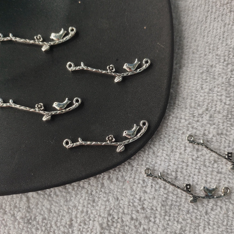 Bird on Stem Pendant