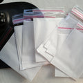 White Pouches Per Piece