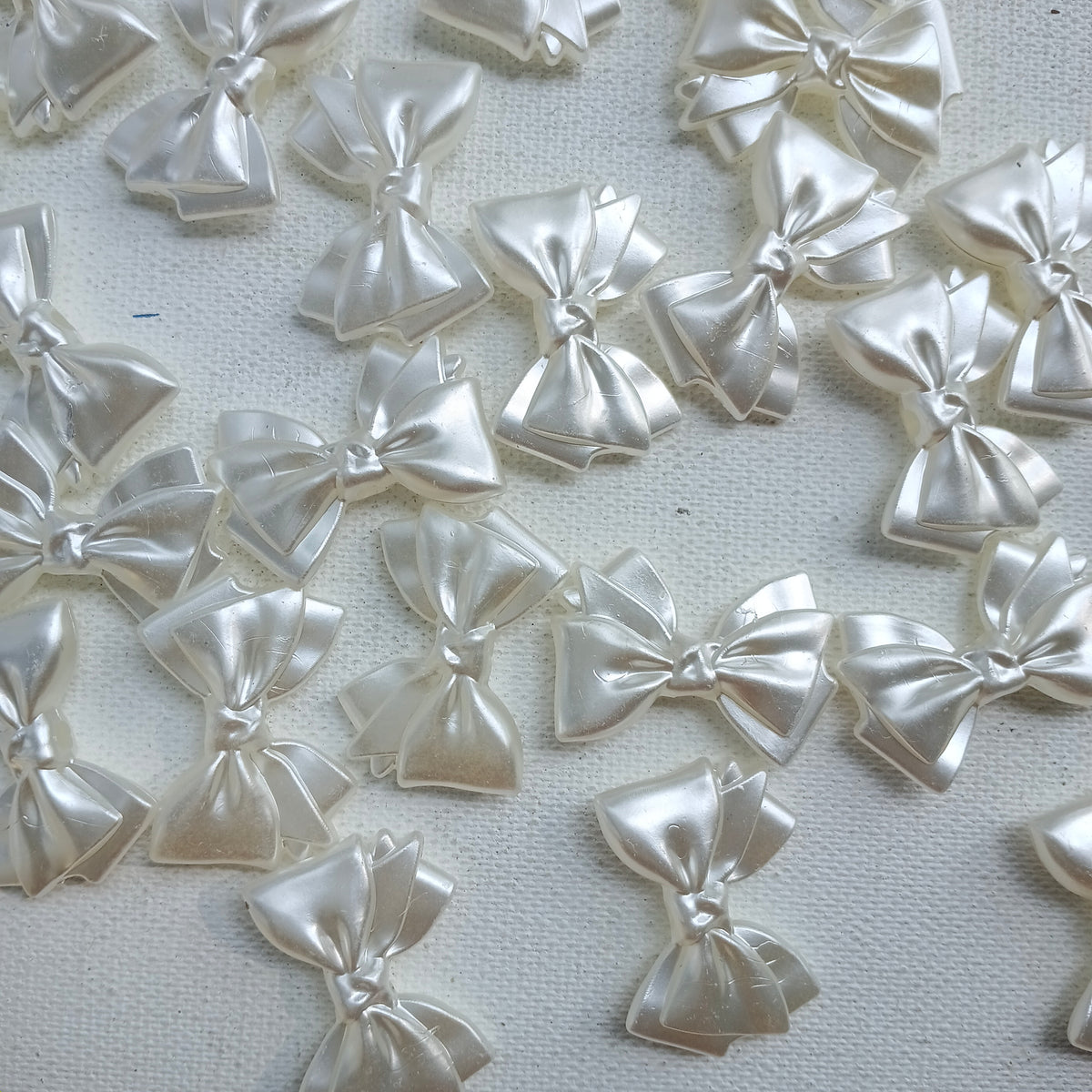 Pearl double bow 10 grm