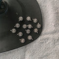 Mini daisy charm