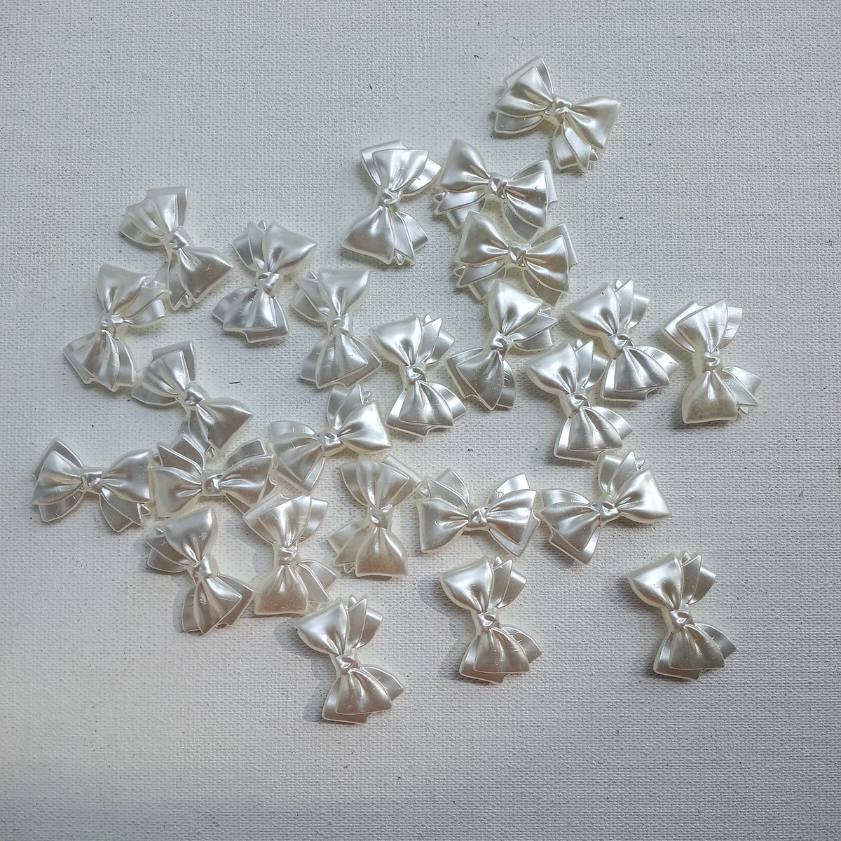 Pearl double bow 10 grm