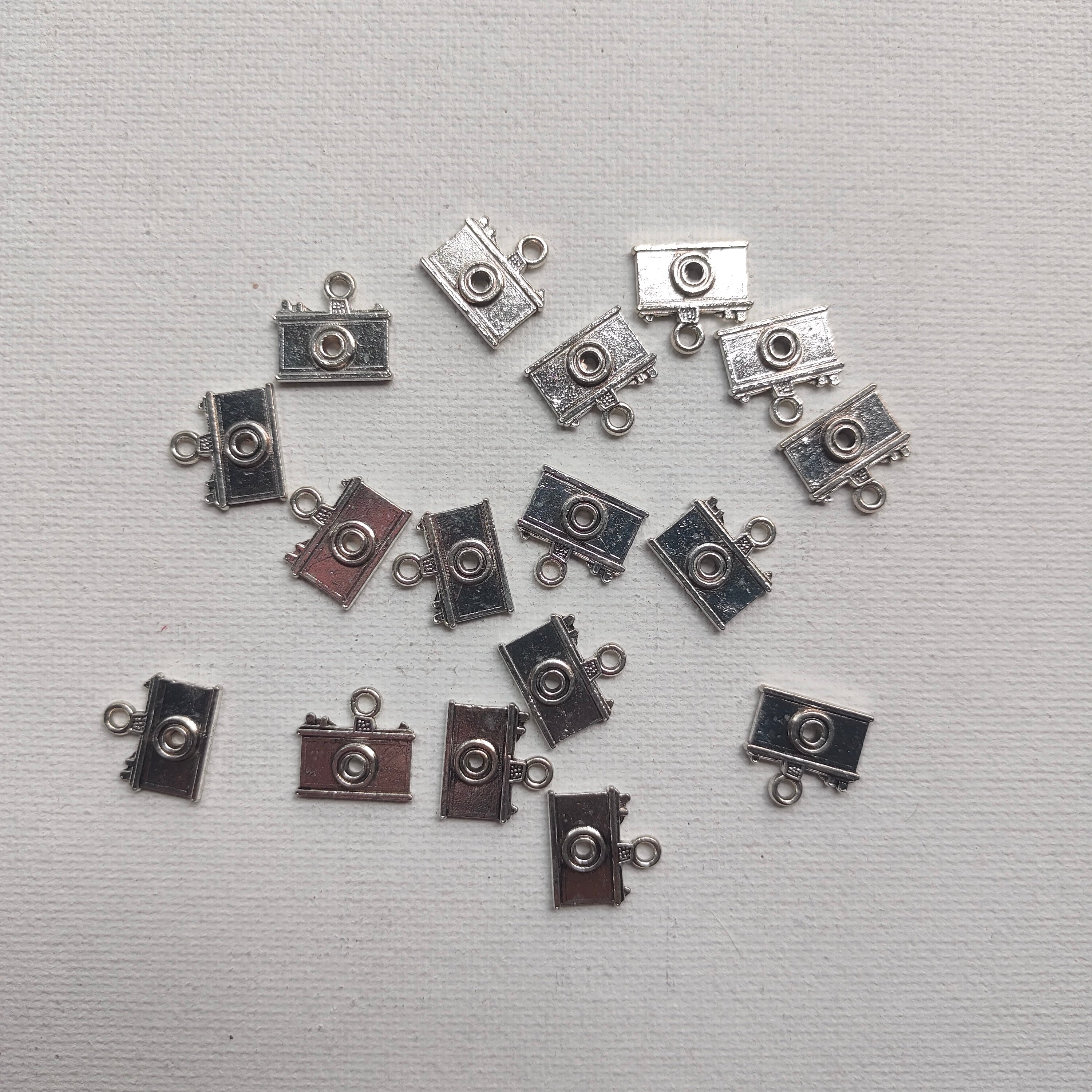 Camera silver charm