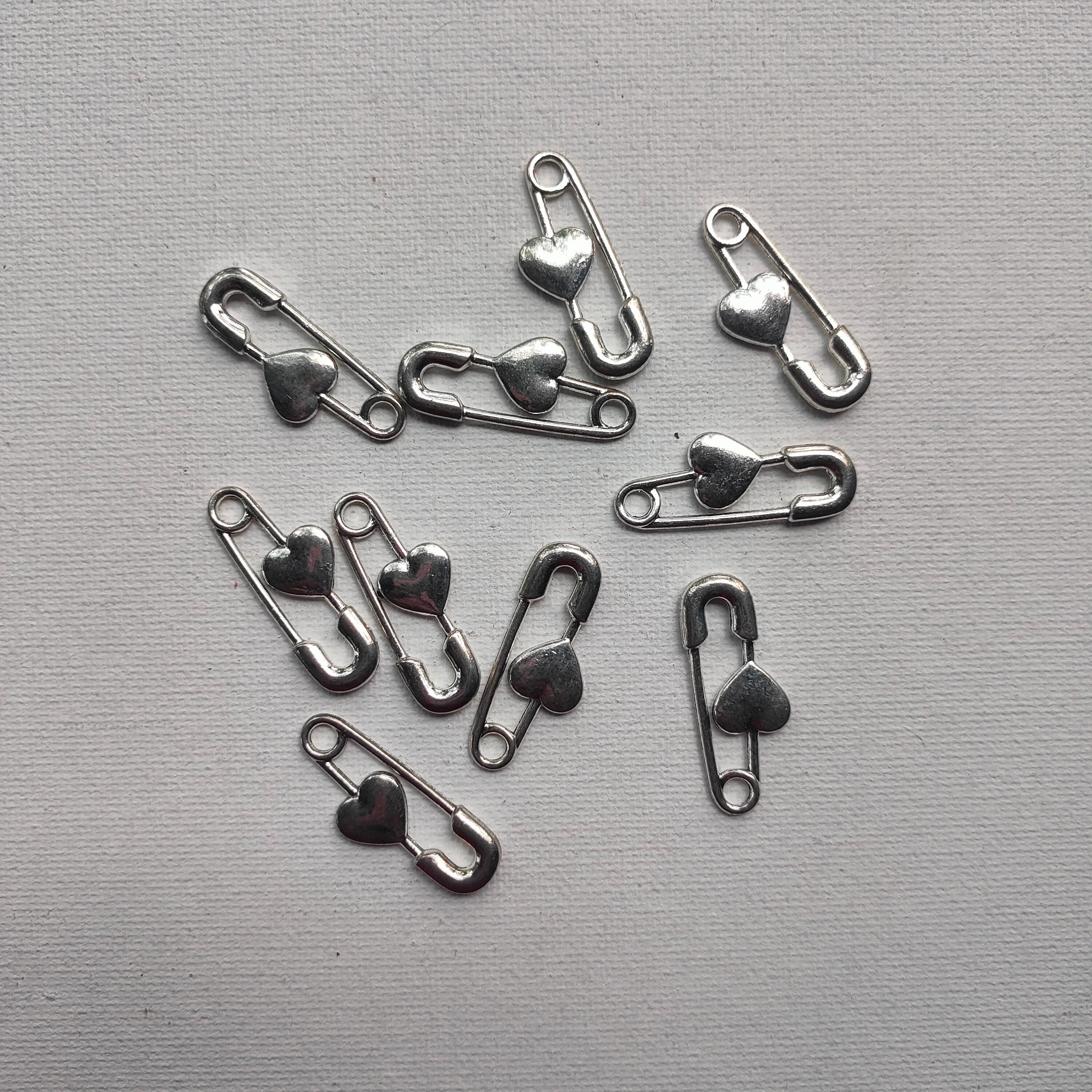 Septi pin silver charm